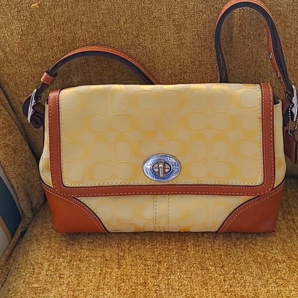 Coach yellow handbag with tan leather trim